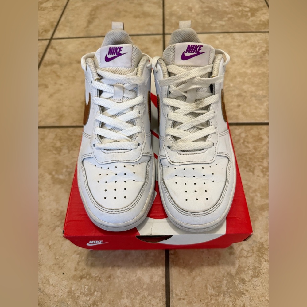 Nike Kids white with gold and purple accents. - Size: 5Y